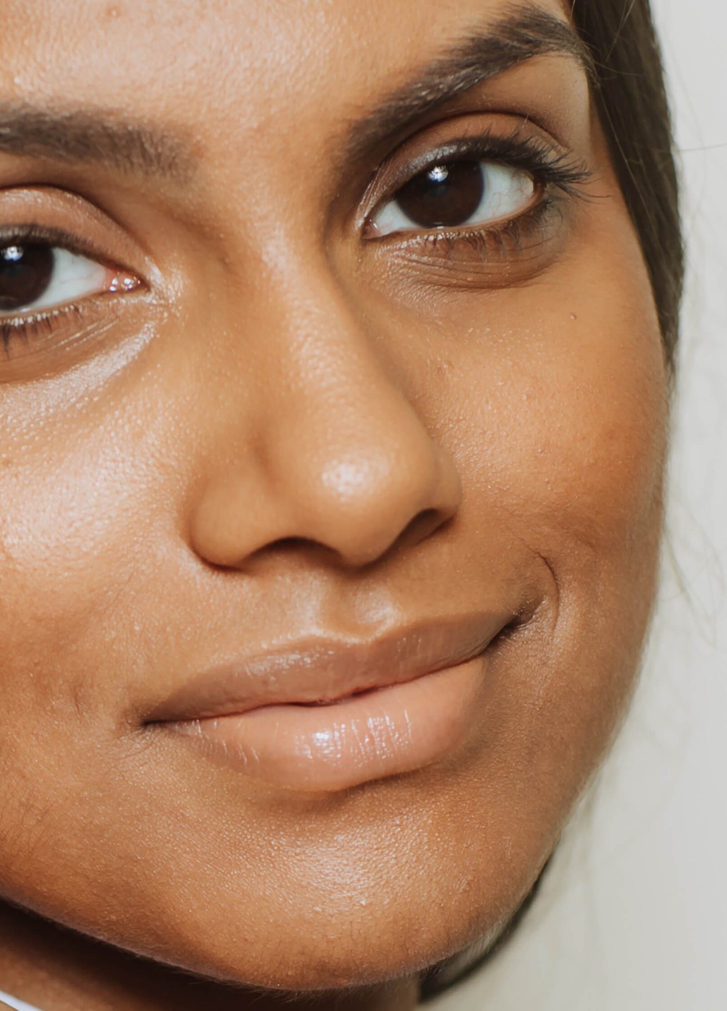vegan cruelty free full coverage concealer creme concealer. +caption_Angela is wearing CN5 #shade_CN5_|_Medium_Neutral